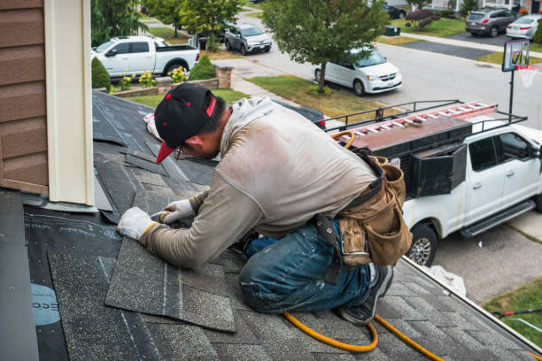 Professional Roofing technician working in Armonk, NY